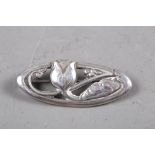 A Georg Jensen oval silver tulip brooch, No178, a gilt metal bauble necklace and matching