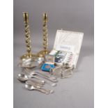 A quantity of silver plated cutlery, a pair of brass candlesticks with twisted column, boxed Royal