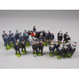 A selection of Britains lead painted toy soldiers, including Royal Marine Light Infantry running
