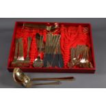 A part canteen of K + G 24 karat gold plated Vergoldet cutlery, a quantity of loose mother-of-