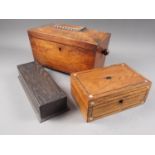 A 19th century rosewood sarcophagus, formed as a tea caddy with ring handles, on bun feet, 14 1/4"