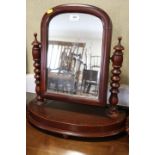 A late Victorian mahogany swing frame toilet mirror, on plateau base, 19" wide
