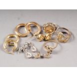 A selection of 9ct gold jewellery, including rings, earrings and a German 8ct gold 1972 Olympics