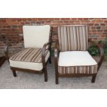 A pair of 1960s bentwood fireside chairs with loose seat and back cushions
