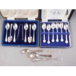 A set of six silver teaspoons and a matching pair of sugar tongs, in fitted box, a set of six