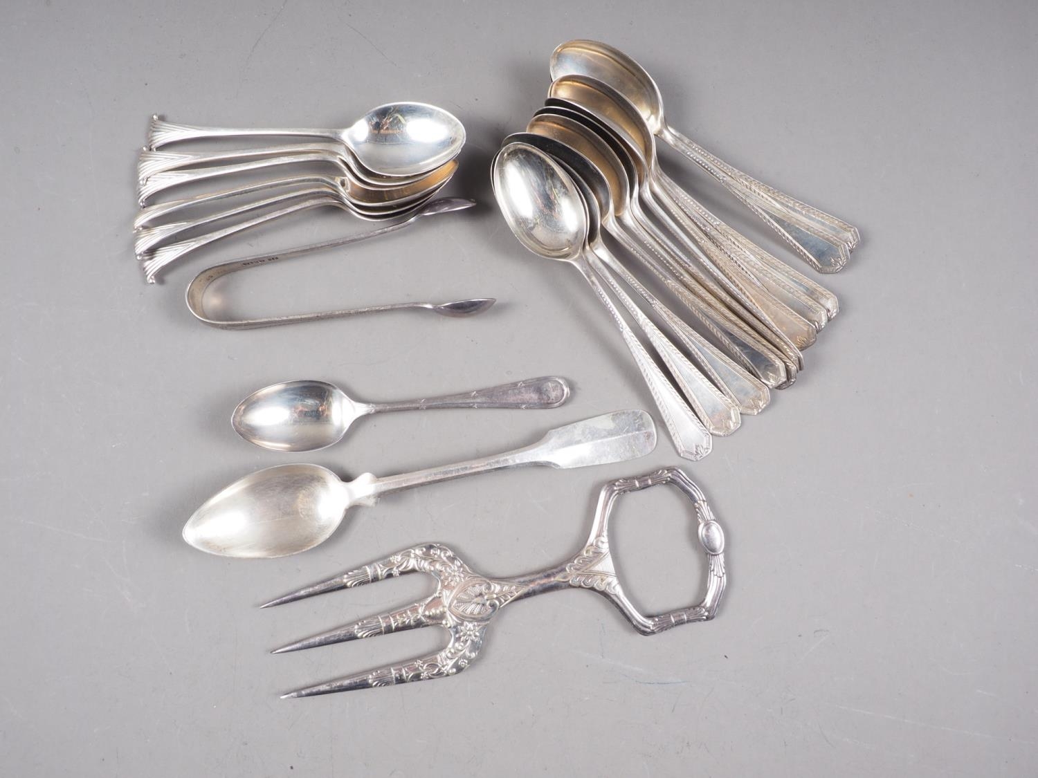 A set of six Arundel pattern silver coffee spoons, twelve bright cut silver coffee spoons, a pair of