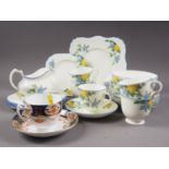 A Tuscan "Plant" pattern part teaset and a Phoenix China "Loos" pattern teacup and saucer