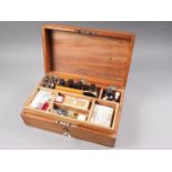 A microscopist's 19th century slide preparation kit, in mahogany case