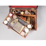 A 19th century rosewood jewellery box, containing a slide preparation set and a portable microscope