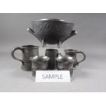 An Art Nouveau pewter tureen base, five pewter mugs and other items