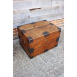 A 19th century iron bound teak strong box/chest with brass carry handles, 26" wide x 17" deep x