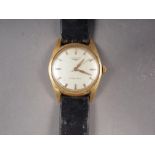 A gentleman's 18ct gold cased Longines wristwatch with manual wind movement numbered 10365277,