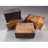 An oak hinged box, on a slope base, 11 1/2" wide, a smaller similar carved oak box, a marquetry