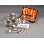 A quantity of loose silver plated cutlery, a sugar bowl, a sauce boat, a milk jug and other items