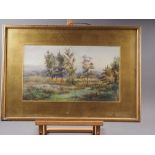L G Gouraine: watercolours, landscape with fence, 10" x 17 1/2", in gilt frame (glazing cracked)