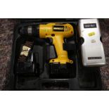 A Dewalt DW953 drill, in case (no charging cable) and a set of Tough-Bilt drill and screwdriver