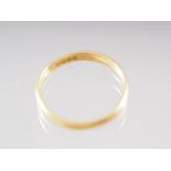 A 22ct gold wedding band, size J, 2.2g