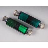A Victorian white metal mounted green glass double-ended scent bottle, 4" long, and another