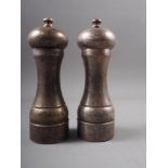 A pair of silver "Peter Piper" pepper mills