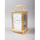 A brass cased carriage clock, 5 1/2" high