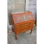 A Sheraton Revival painted and banded satinwood fall front bureau with fitted interior over three