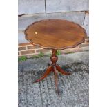 A maple loop back bedroom chair, a mahogany shape top wine table, 20" dia x 25 1/2" high, and a