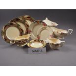 A Myott Son & Co "England's Countryside" pattern part dinner service and a Crown Ducal floral