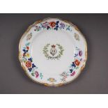 An early 19th century bone china polychrome enamel and gilt decorated mess plate for 13th Light