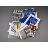 A collection of Royal Mail presentation packs, and year packs in an album