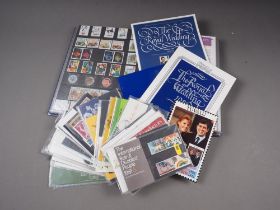 A collection of Royal Mail presentation packs, and year packs in an album