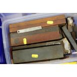 A collection of oil stones and other sharpening stones, etc