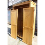 A modern light oak two-door wardrobe, 45" wide