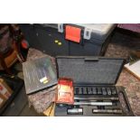 A Zag wheeled toolbox, a cased socket set, three sets of screwdrivers, etc