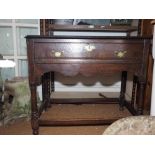 A 19th century provincial oak side table, fitted one drawer, on turned and stretchered supports, 33"