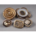 A Victorian 15ct gold mourning brooch, set seed pearl, and four other similar yellow metal brooches
