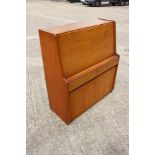 A 1960s teak fall front bureau with fitted interior over two drawers and cupboards, 36" wide x 16"