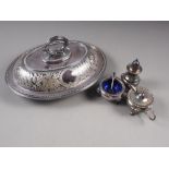 A silver plated entree dish and cover with engraved leaf decoration, and a plated three-piece