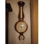 A modern mahogany cased aneroid barometer, thermometer and hygrometer, 26" high