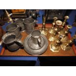 A quantity of early 19th century and later pewter, including five tankards, and seven 18th century