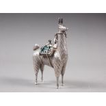 A white metal model of a llama, stamped 950