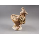 A Royal Crown Dux table centre, formed as a girl playing a flute seated on a shell, 10 1/2" high