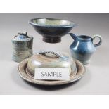 A collection of blue salt glazed studio pottery, impressed JH, comprising four dishes, a cheese dish