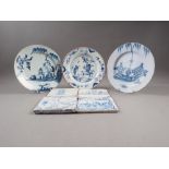 Four 18th century Delft tiles, all approximately 5" square, and three English delft plates (damages)