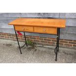 A pair of cherrywood and metal framed console table, fitted two drawers, on stretchered supports, 44