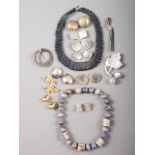 A selection of 20th century Modernist silver jewellery, comprising two necklaces, seven pairs of