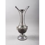 A Continental sprinkler vase, decorated in high relief in the Aesthetic manner, on turned marble