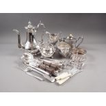 A part canteen of silver plated cutlery, a plated coffee pot, a wine bottle coaster, loose fish