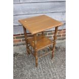 A William Morris design for Liberty two-tier occasional table (later brown painted), 17" square x