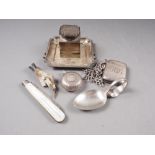 An Art Deco inkstand with engine turned decoration, a silver sovereign case, a vesta case with
