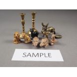 A collection of Wade Whimsies, a collection of painted lead toys and a collection of brass animal